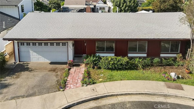 13624 Vose St, Valley Glen, CA 91405 - ranch-style house with a garage, driveway, and roof with shingles