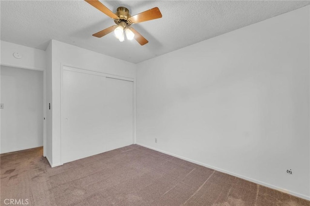 13624 Vose St, Valley Glen, CA 91405 - unfurnished bedroom featuring carpet, a closet, a textured ceiling, and a ceiling fan