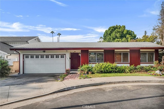 13624 Vose St, Valley Glen, CA 91405 - ranch-style house with an attached garage and asphalt driveway