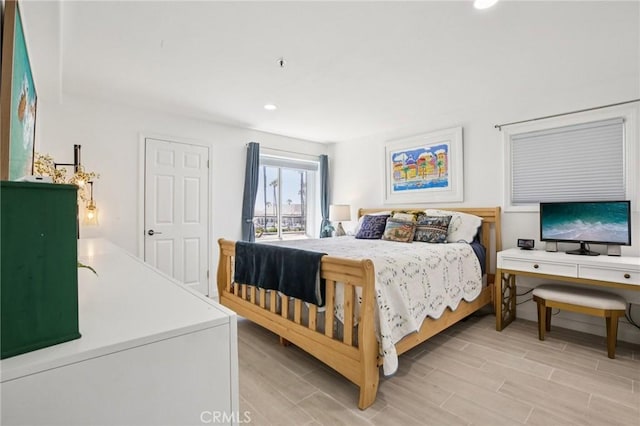 200 Pacific Coast Unit 130, Huntington Beach, CA 92648 - bedroom with light wood-style flooring and recessed lighting