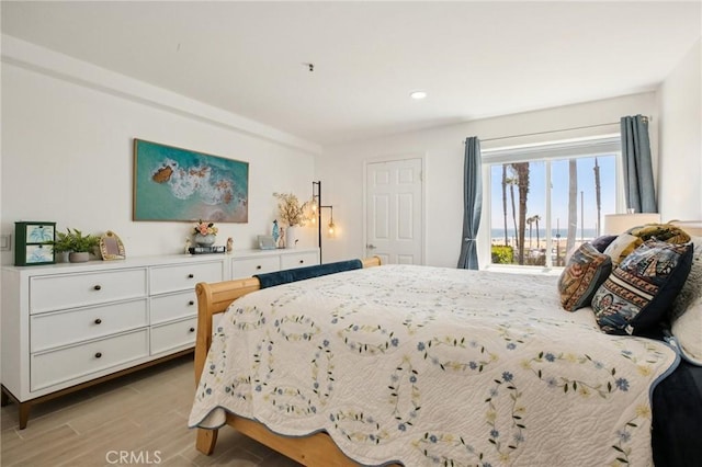 200 Pacific Coast Unit 130, Huntington Beach, CA 92648 - bedroom featuring light wood-type flooring and recessed lighting