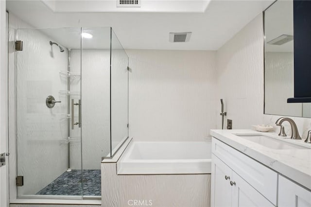 200 Pacific Coast Unit 130, Huntington Beach, CA 92648 - full bath featuring a garden tub, vanity, and a stall shower