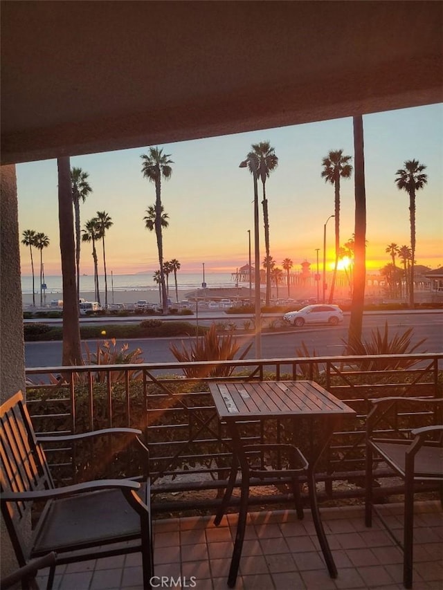 200 Pacific Coast Unit 130, Huntington Beach, CA 92648 - balcony at dusk with a water view