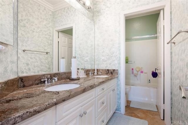 2792 Rambling Vistas Rd, Chula Vista, CA 91915 - full bath featuring wallpapered walls, double vanity, ornamental molding, and washtub / shower combination