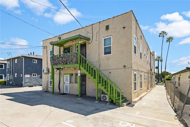 213 S Atlantic Blvd, Alhambra, CA 91801 - view of front of property with stairs and stucco siding