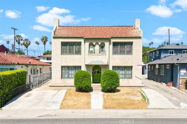 213 S Atlantic Blvd, Alhambra, CA 91801 - mediterranean / spanish-style home with a chimney, stucco siding, and a tile roof