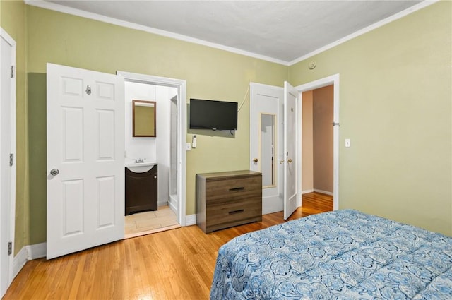 213 S Atlantic Blvd, Alhambra, CA 91801 - bedroom with light wood-style flooring and crown molding