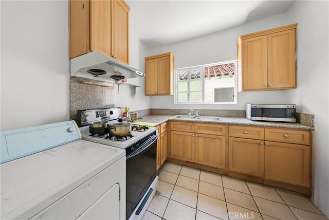 213 S Atlantic Blvd, Alhambra, CA 91801 - kitchen featuring washer / dryer, stainless steel microwave, stove, under cabinet range hood, and light countertops
