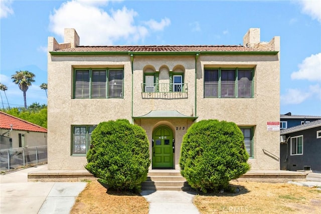 213 S Atlantic Blvd, Alhambra, CA 91801 - view of front of house featuring a chimney, a tiled roof, and stucco siding