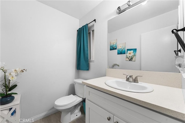 15060 Chatsworth St Unit E, San Fernando, CA 91345 - bathroom with vanity and wood finished floors