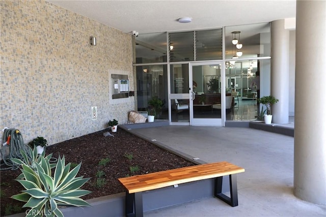 100 Atlantic Ave Unit 906, Long Beach, CA 90802 - property entrance with a surveillance system and a patio area