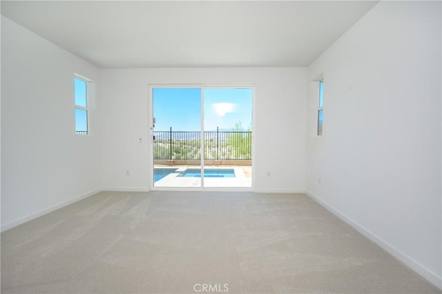 193 Mustang Ln, Palm Springs, CA 92262 - unfurnished room with light carpet