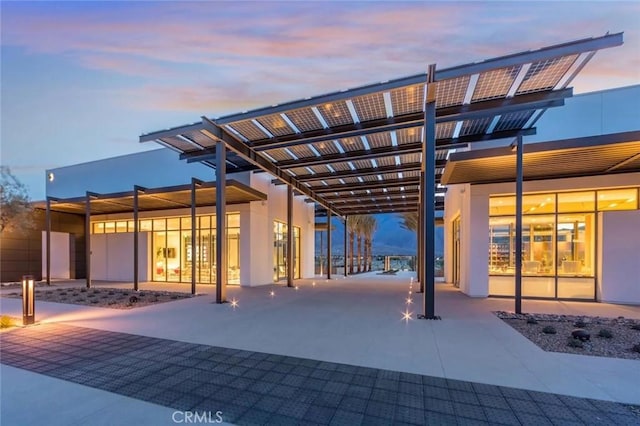 193 Mustang Ln, Palm Springs, CA 92262 - rear view of property featuring a pergola