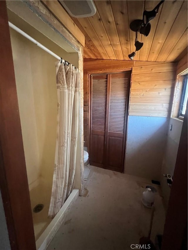 56554 Rd 200, North Fork, CA 93643 - full bathroom featuring a stall shower, wood walls, and wood ceiling