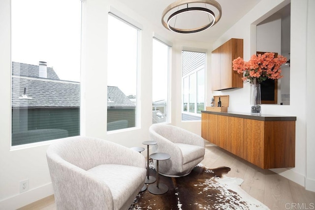 12794 Via Felino, Del Mar, CA 92014 - living area featuring light wood-style floors and baseboards
