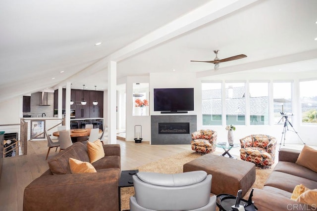 12794 Via Felino, Del Mar, CA 92014 - living area with a glass covered fireplace, light wood-style flooring, a ceiling fan, and recessed lighting