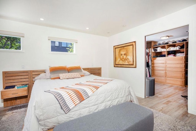 12794 Via Felino, Del Mar, CA 92014 - bedroom with light wood-style flooring, a spacious closet, a closet, and recessed lighting