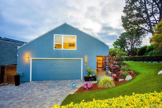 12794 Via Felino, Del Mar, CA 92014 - view of front of house with stucco siding, a front yard, and decorative driveway