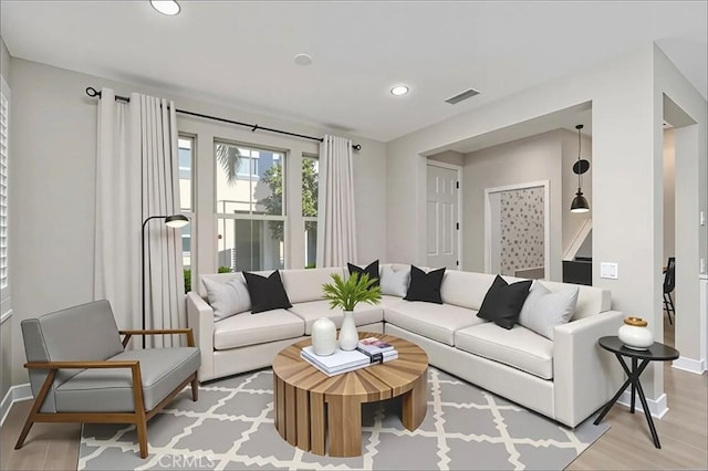 72 Granite, Irvine, CA 92620 - living area featuring recessed lighting and light wood-style floors