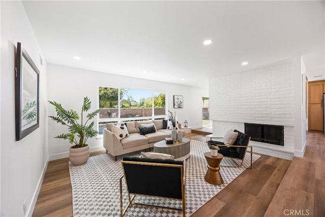 1809 Celeste Ln, Fullerton, CA 92833 - living room with wood finished floors, a brick fireplace, and recessed lighting