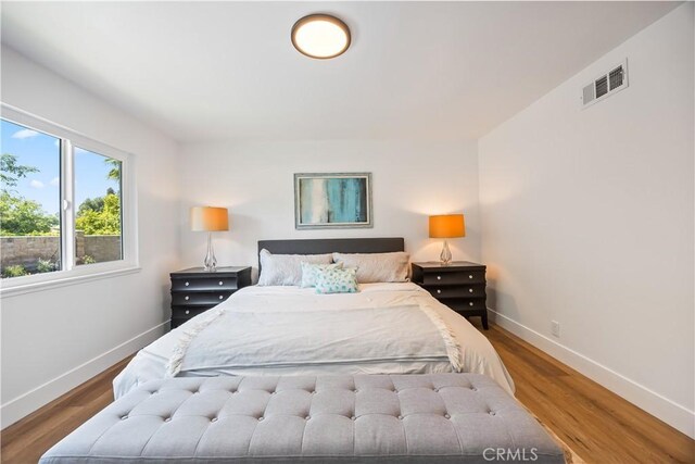 1809 Celeste Ln, Fullerton, CA 92833 - bedroom featuring baseboards and wood finished floors