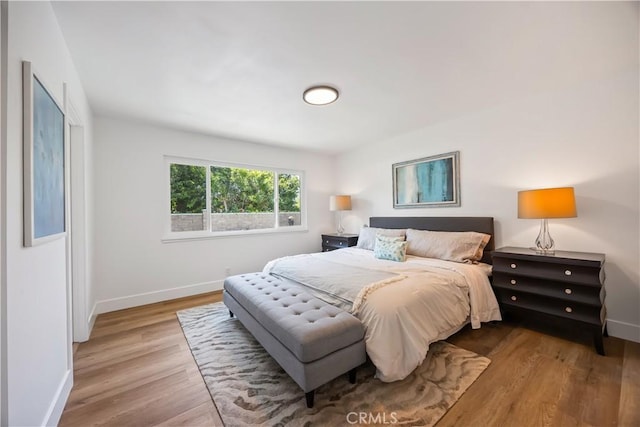 1809 Celeste Ln, Fullerton, CA 92833 - bedroom featuring baseboards and wood finished floors