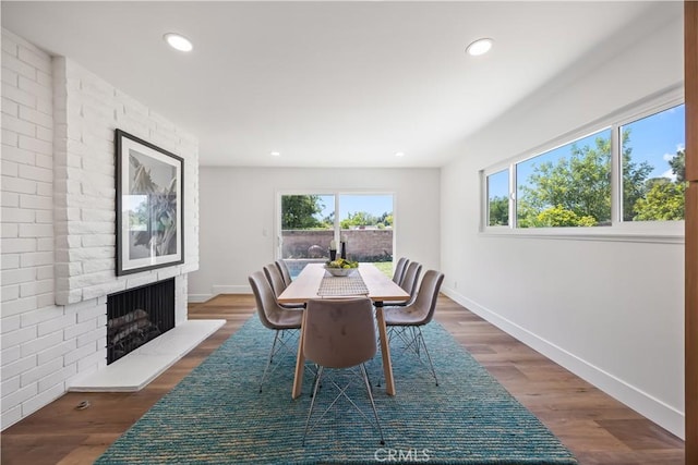 1809 Celeste Ln, Fullerton, CA 92833 - dining room featuring recessed lighting, a large fireplace, and wood finished floors