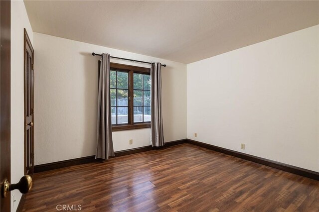 31681 Peppertree, San Juan Capistrano, CA 92675 - unfurnished room with dark wood finished floors and baseboards