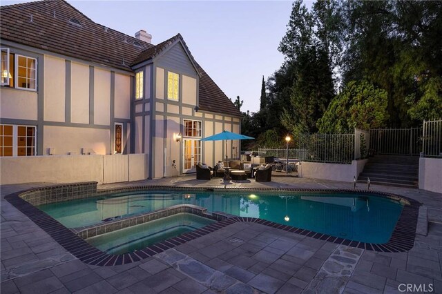 31681 Peppertree, San Juan Capistrano, CA 92675 - view of swimming pool featuring a patio, outdoor lounge area, and a pool with connected hot tub