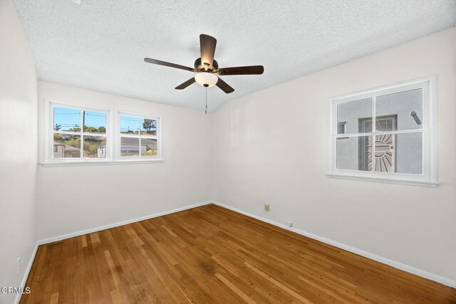 2056 Fulton Ave, Monterey Park, CA 91755 - spare room with wood finished floors, ceiling fan, and a textured ceiling