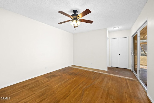 2056 Fulton Ave, Monterey Park, CA 91755 - unfurnished bedroom with wood finished floors, a textured ceiling, and a ceiling fan