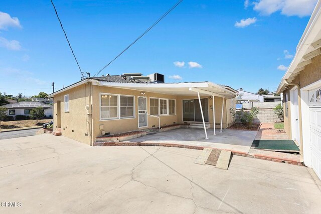2056 Fulton Ave, Monterey Park, CA 91755 - back of house with stucco siding, a patio area, and crawl space
