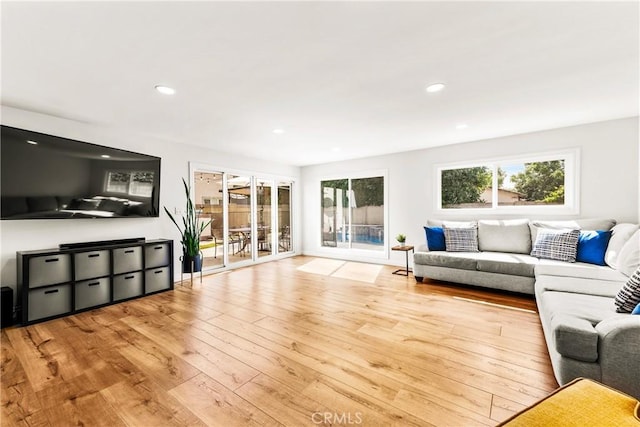 8110 True Ave, Pico Rivera, CA 90660 - living room with hardwood / wood-style flooring and recessed lighting