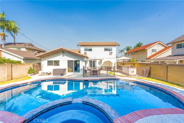 8110 True Ave, Pico Rivera, CA 90660 - view of pool featuring a pool with connected hot tub, a fenced backyard, and a patio area