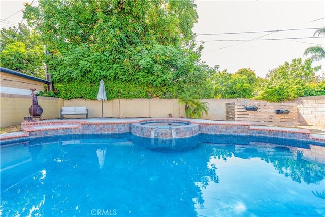 8110 True Ave, Pico Rivera, CA 90660 - view of pool with a pool with connected hot tub and a fenced backyard