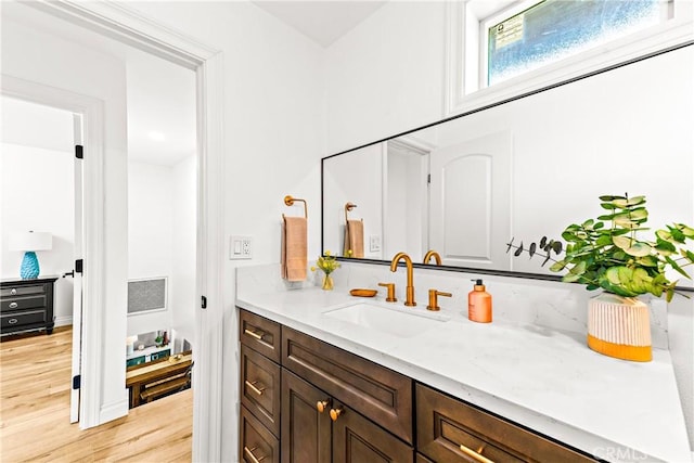 8110 True Ave, Pico Rivera, CA 90660 - bathroom featuring vanity and wood finished floors
