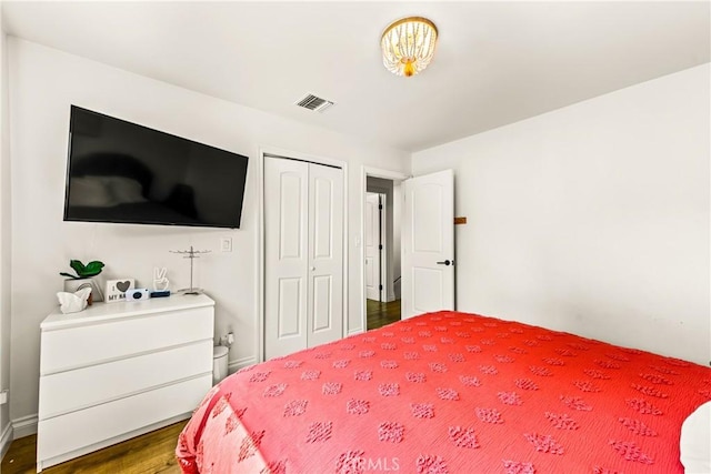 8110 True Ave, Pico Rivera, CA 90660 - bedroom with a closet and wood finished floors