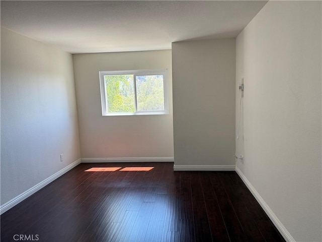 800 Grand Ave Unit A12, Diamond Bar, CA 91765 - unfurnished room featuring baseboards and hardwood / wood-style floors