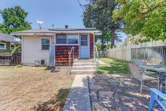 320 W Lemon Ave, Monrovia, CA 91016 - rear view of property with a fenced backyard, outdoor dining area, and a patio