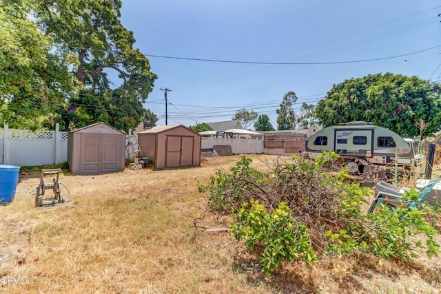 320 W Lemon Ave, Monrovia, CA 91016 - fenced backyard featuring a storage unit