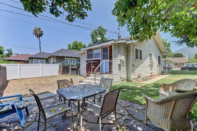 320 W Lemon Ave, Monrovia, CA 91016 - fenced backyard with a patio and outdoor dining space