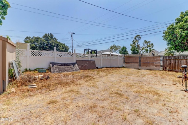 320 W Lemon Ave, Monrovia, CA 91016 - view of yard featuring a gate