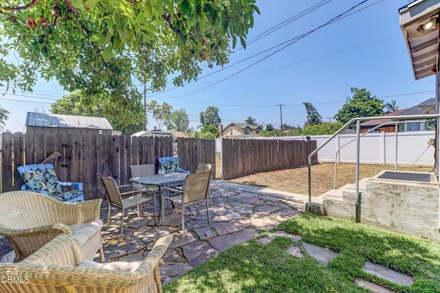 320 W Lemon Ave, Monrovia, CA 91016 - fenced backyard with a patio and outdoor dining space