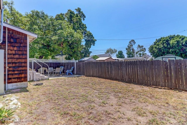 320 W Lemon Ave, Monrovia, CA 91016 - fenced backyard featuring a patio area