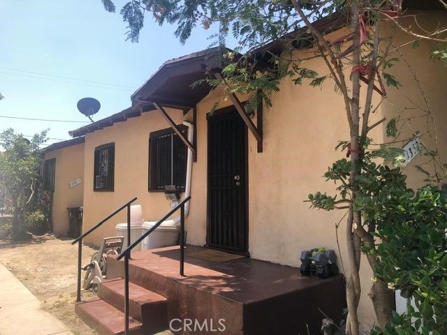 1350 E 43rd St, Los Angeles, CA 90011 - view of exterior entry with stucco siding