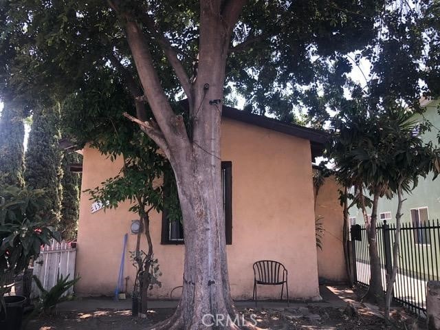 1350 E 43rd St, Los Angeles, CA 90011 - view of home's exterior featuring stucco siding