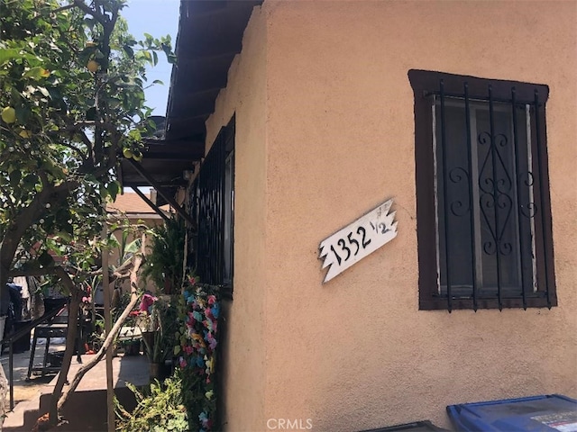1350 E 43rd St, Los Angeles, CA 90011 - exterior view of stucco siding