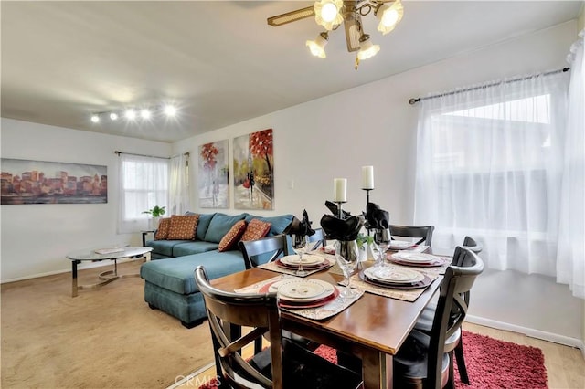 6220 Myrtle Ave, Long Beach, CA 90805 - dining area with a ceiling fan and baseboards