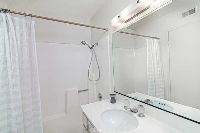 5870 Winncliff Dr, Jurupa Valley, CA 92509 - full bathroom featuring vanity and shower / bath combo