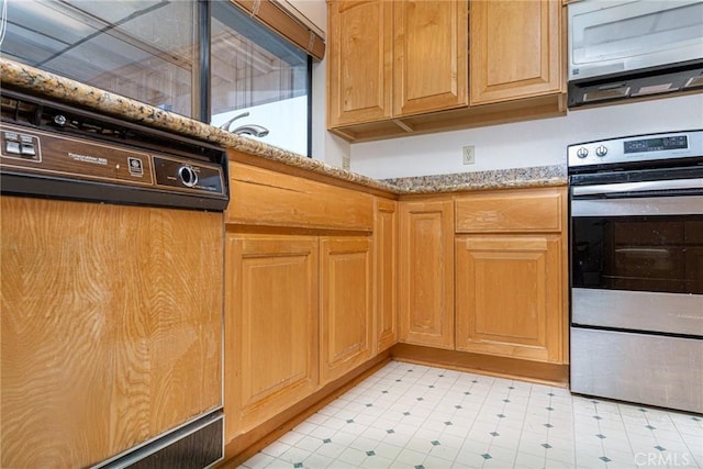 5870 Winncliff Dr, Jurupa Valley, CA 92509 - kitchen featuring electric stove, white microwave, and light stone counters